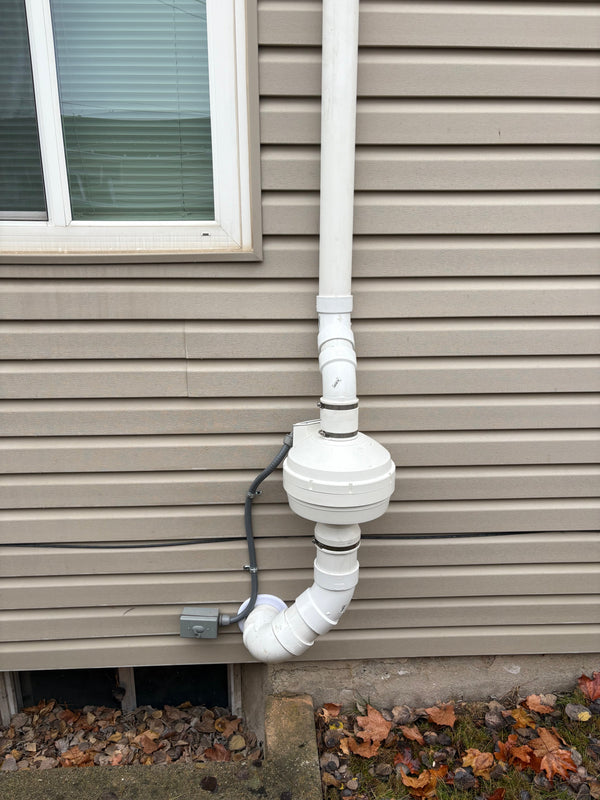 exterior mounted radon mitigation fan on 3" PVC pipe